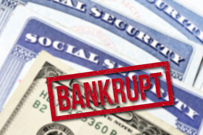 Social Security Cards representing Bankrupt System Loss of Money