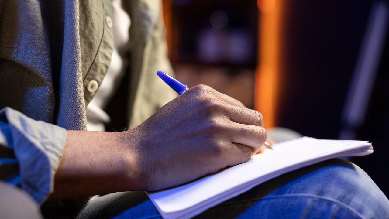 Man reviews SSDI work activity report while tracking earnings