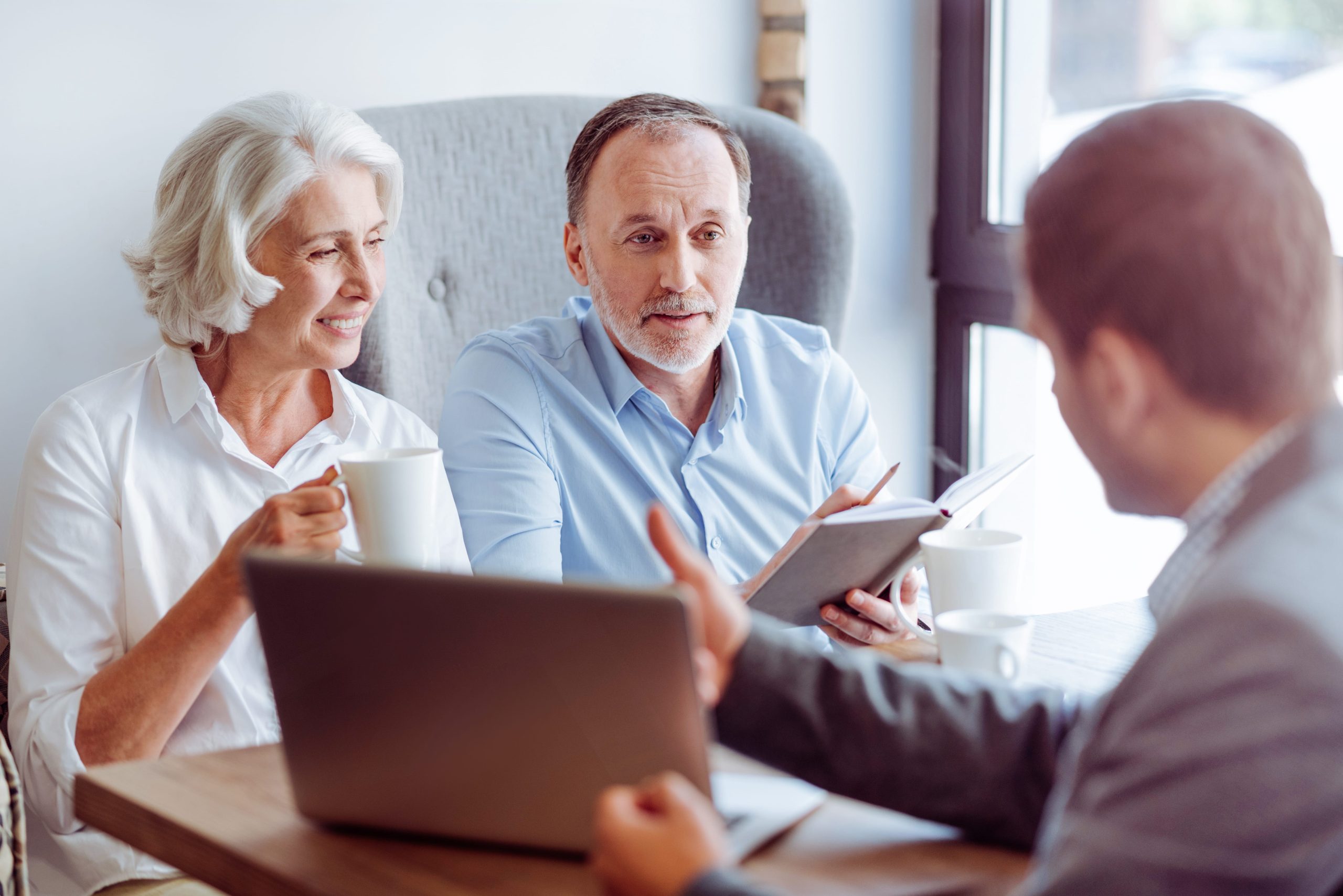 Person reviewing SSA work credit records with attorney to understand SSDI 5-year rule for Social Security disability eligibility.