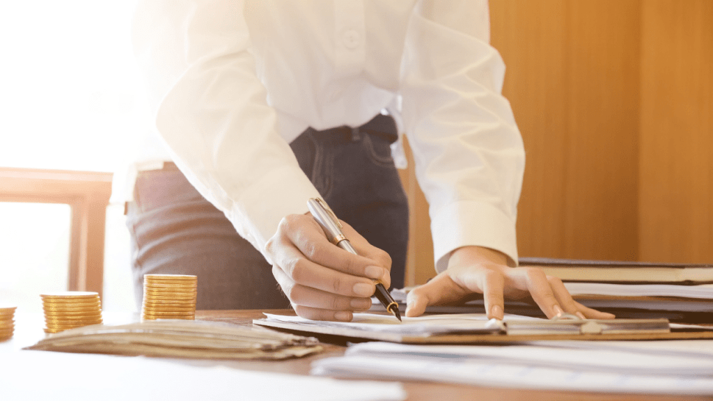 Woman reviews SSA earnings statement with checklist on how to maximize SSDI