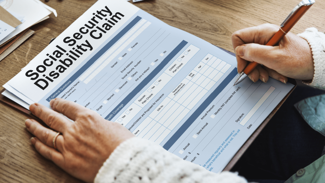 Person filling out Social Security Disability Claim form — how much does SSDI pay?