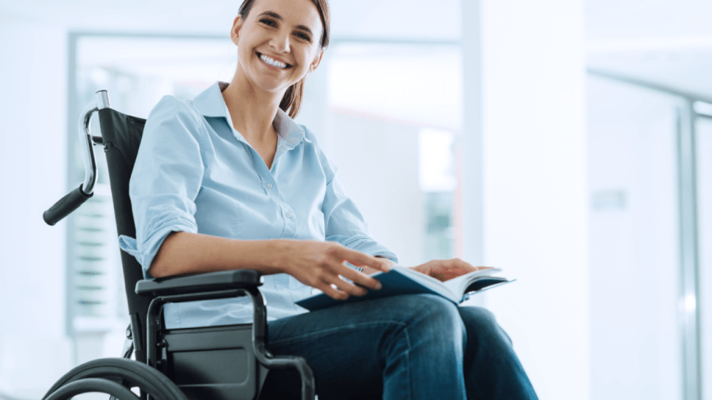 Professional woman in wheelchair researching how do they figure out how much you get for social security disability while reading documents in bright modern office