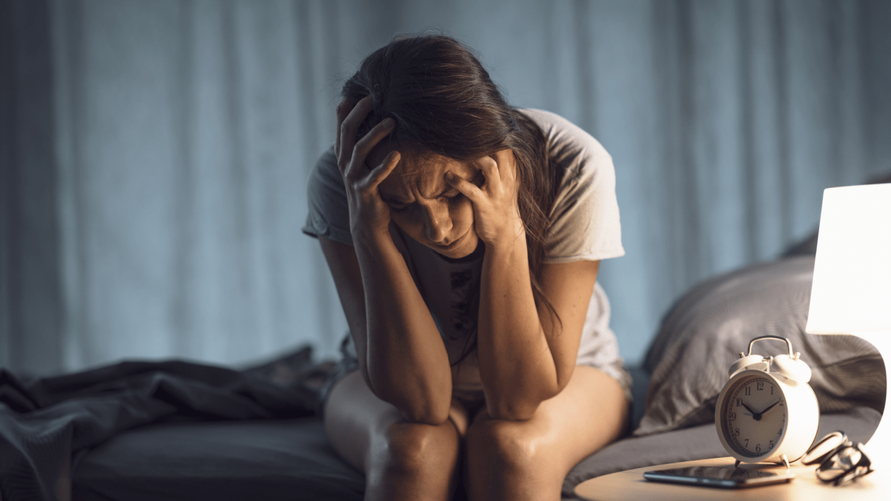 Woman showing symptoms of anxiety disorder related to what is the average disability check for anxiety