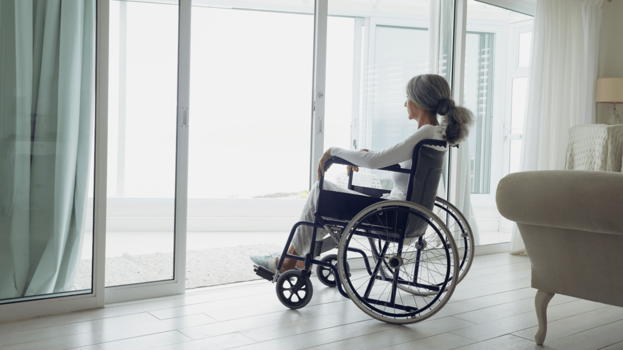 Senior woman in wheelchair planning how to get $3,000 a month in Social Security benefits