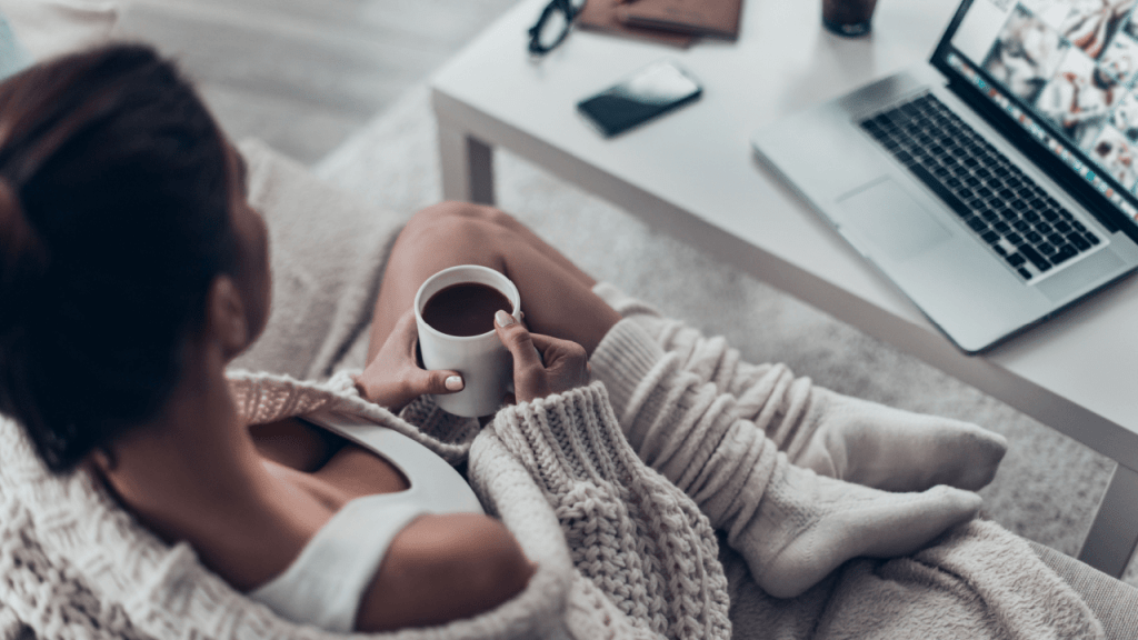 Person researching how long does SSDI last while working on laptop at home with coffee