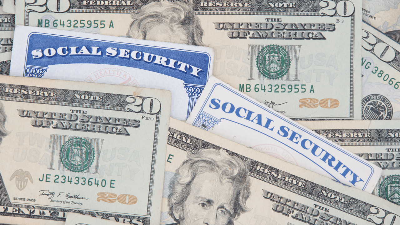 Social Security cards with cash showing how to survive financially while waiting for disability benefits