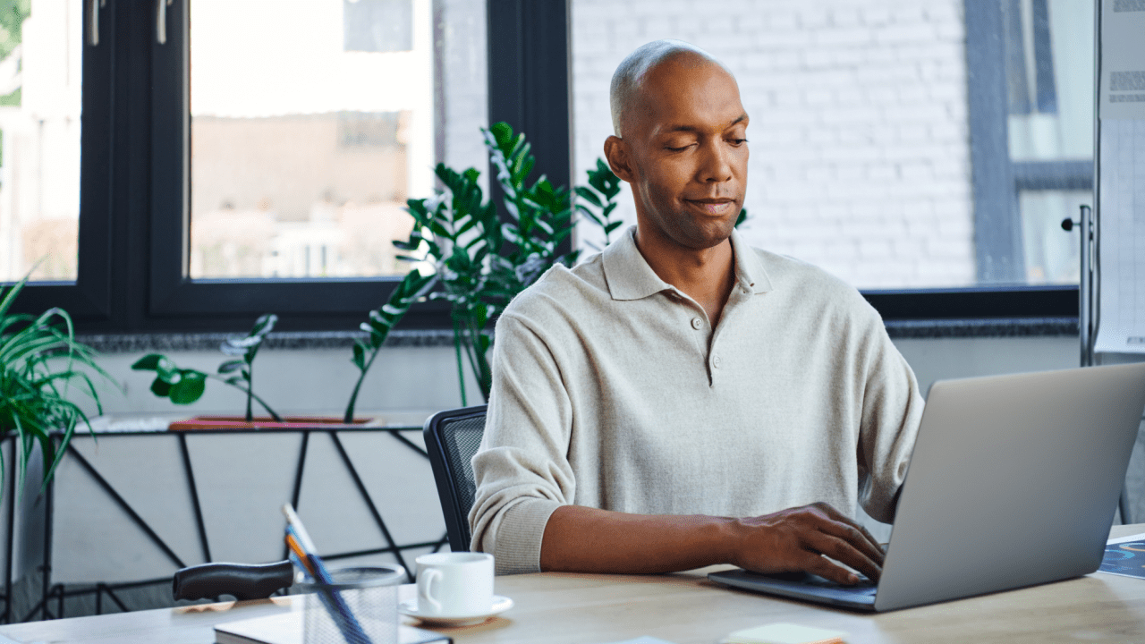 Man researching what are the 5 steps for SSDI application process on laptop computer