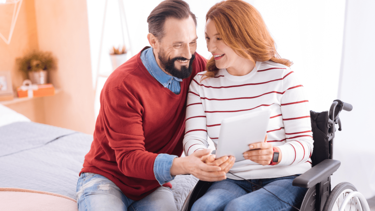 Couple reviewing medical documents to understand what medical evidence is needed for disability benefits application