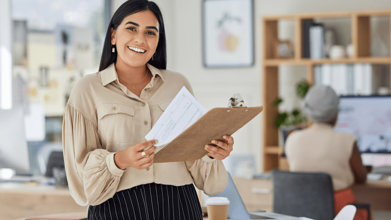 Professional disability advocate holding SSDI reconsideration paperwork showing how to win SSDI reconsideration effectively