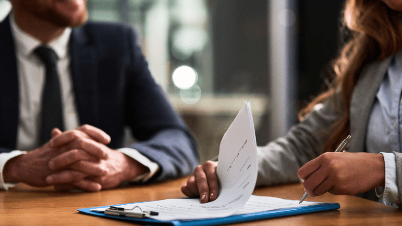 Professional consultation about is it worth it to appeal an SSDI denial with lawyer reviewing paperwork