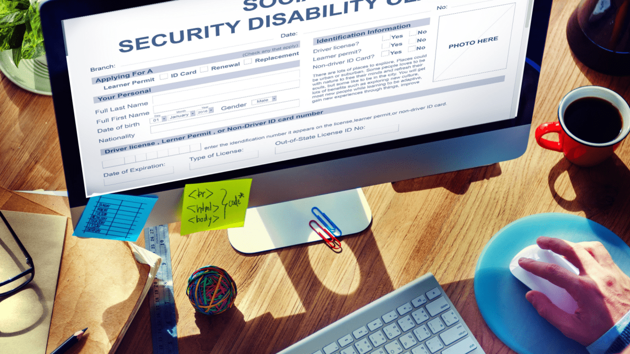 Person completing Social Security disability application on computer screen showing signs you will be approved for social security disability