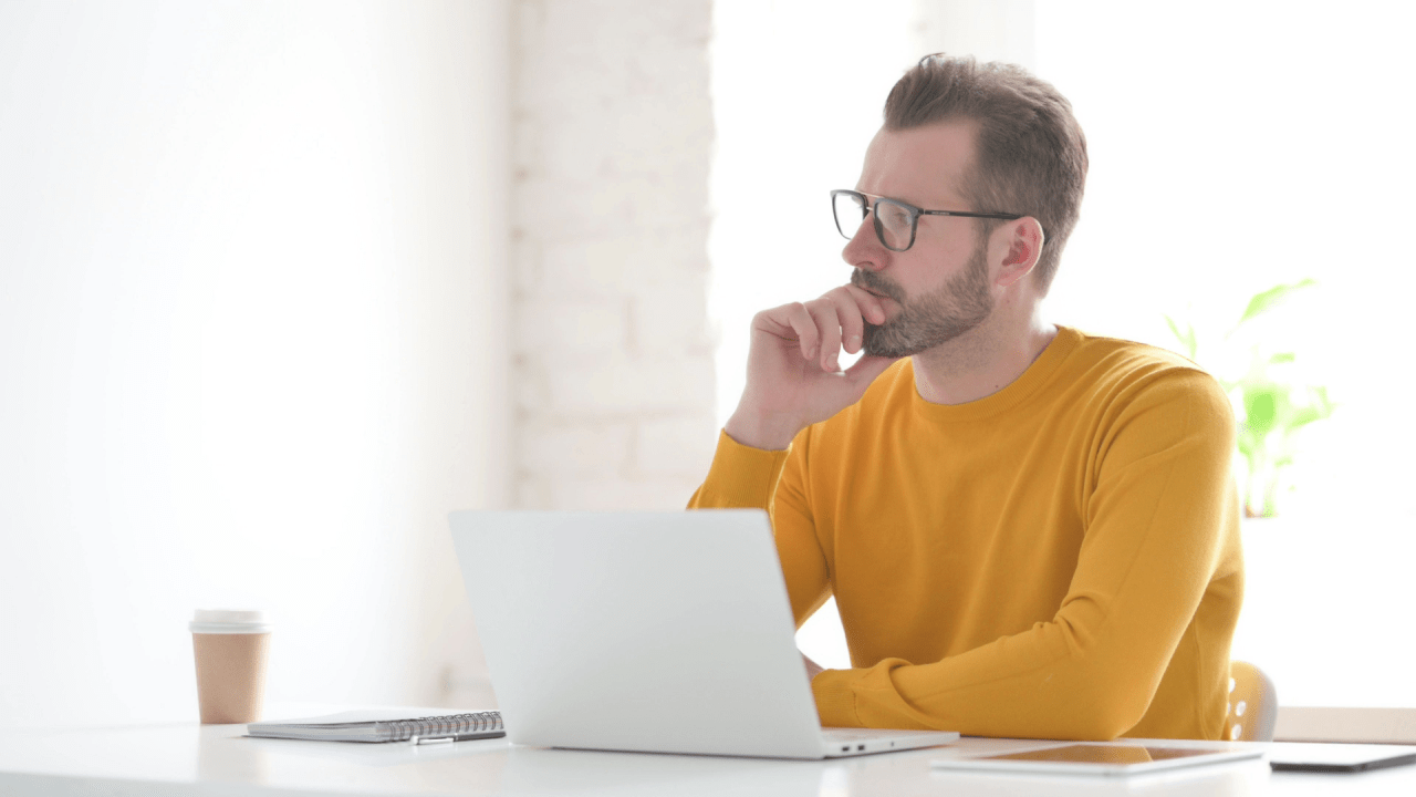 Man researching Social Security disability information to learn what disqualifies you from SSDI