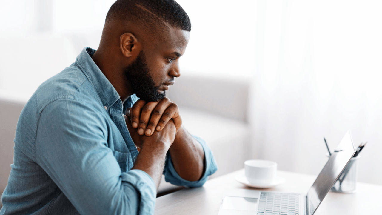 Man researching disability benefits to understand what is the easiest thing to get disability for