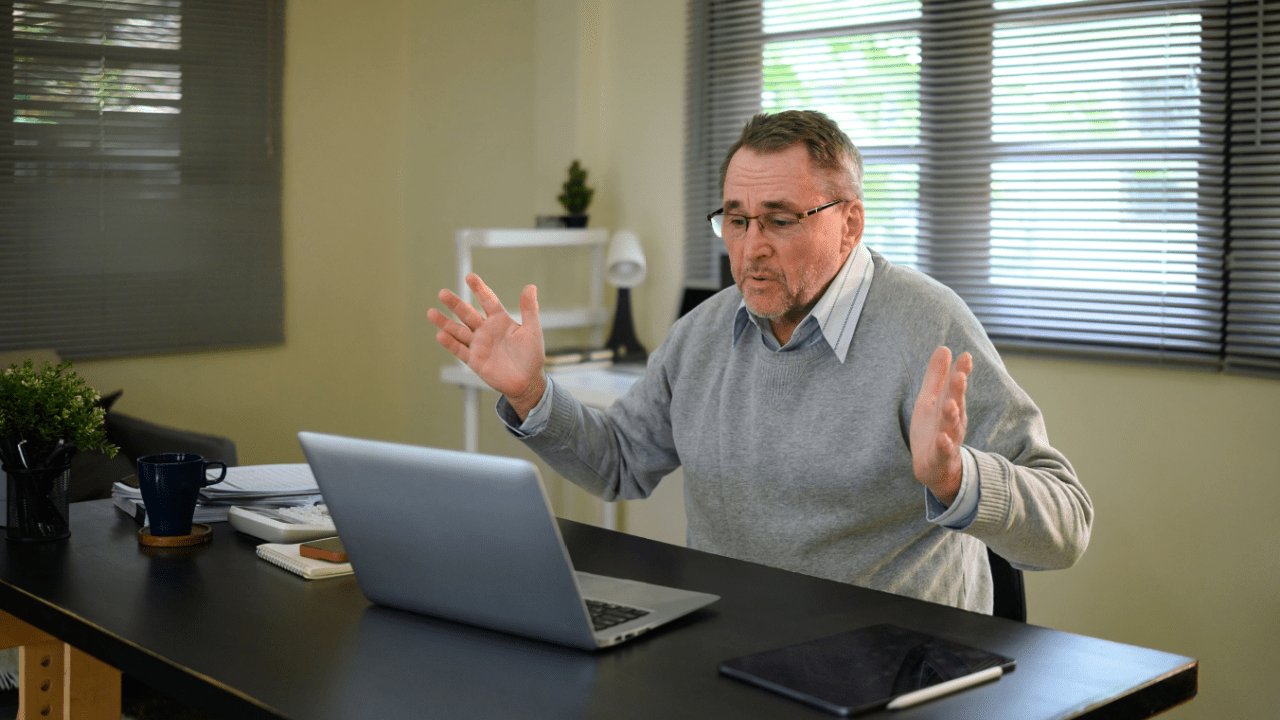 Man participating in video interview learning what not to say at a SSDI interview