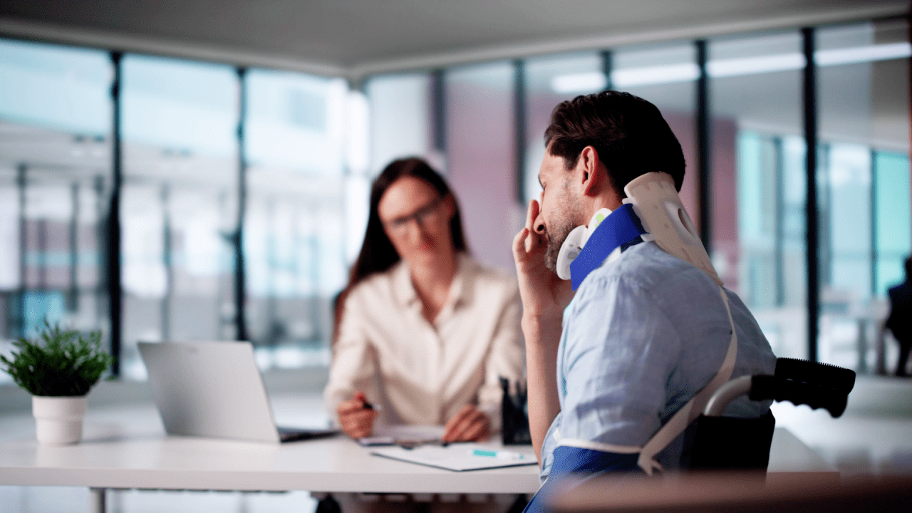 Professional discussing what is one of the biggest mistakes people make regarding Social Security during disability consultation