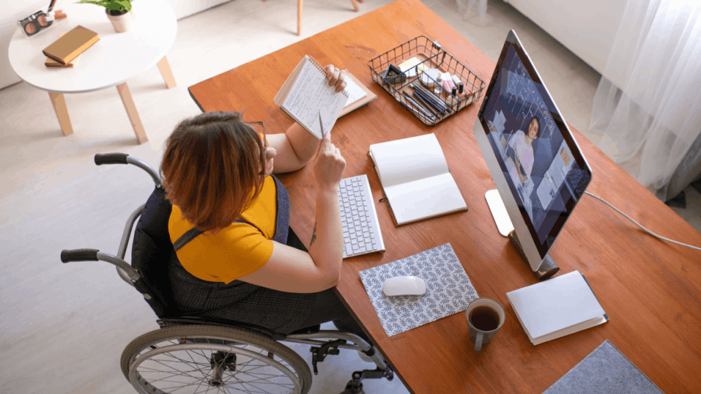 What is the fastest approval for SSDI application woman in wheelchair completing disability claim paperwork at desk