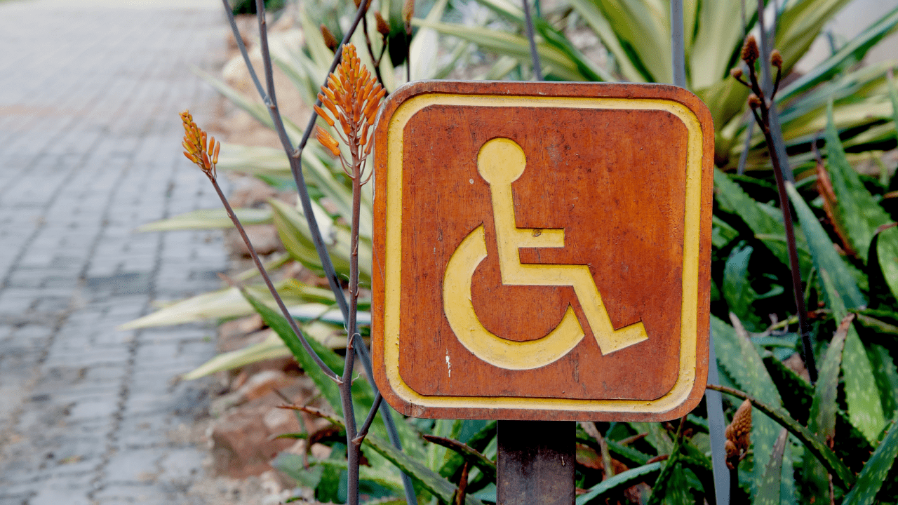 What proof do you need to show that you are disabled - wheelchair accessibility sign representing disability documentation requirements