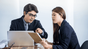 Professional advisor explaining to client how often does Social Security disability reevaluate benefits